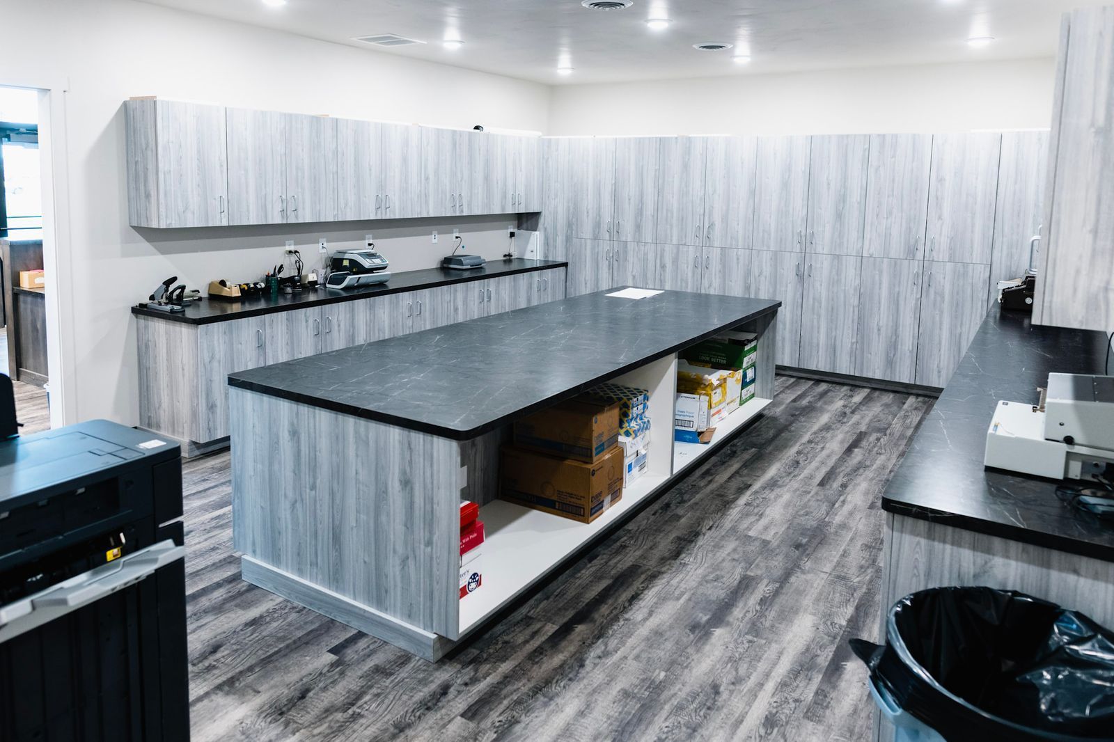 There is a large island in the middle of the kitchen