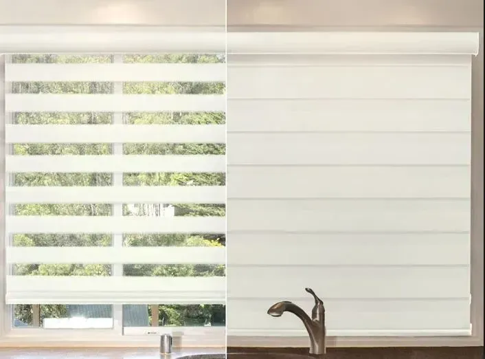 Two window blinds, one open, one closed; showing view and light control in cream colors.