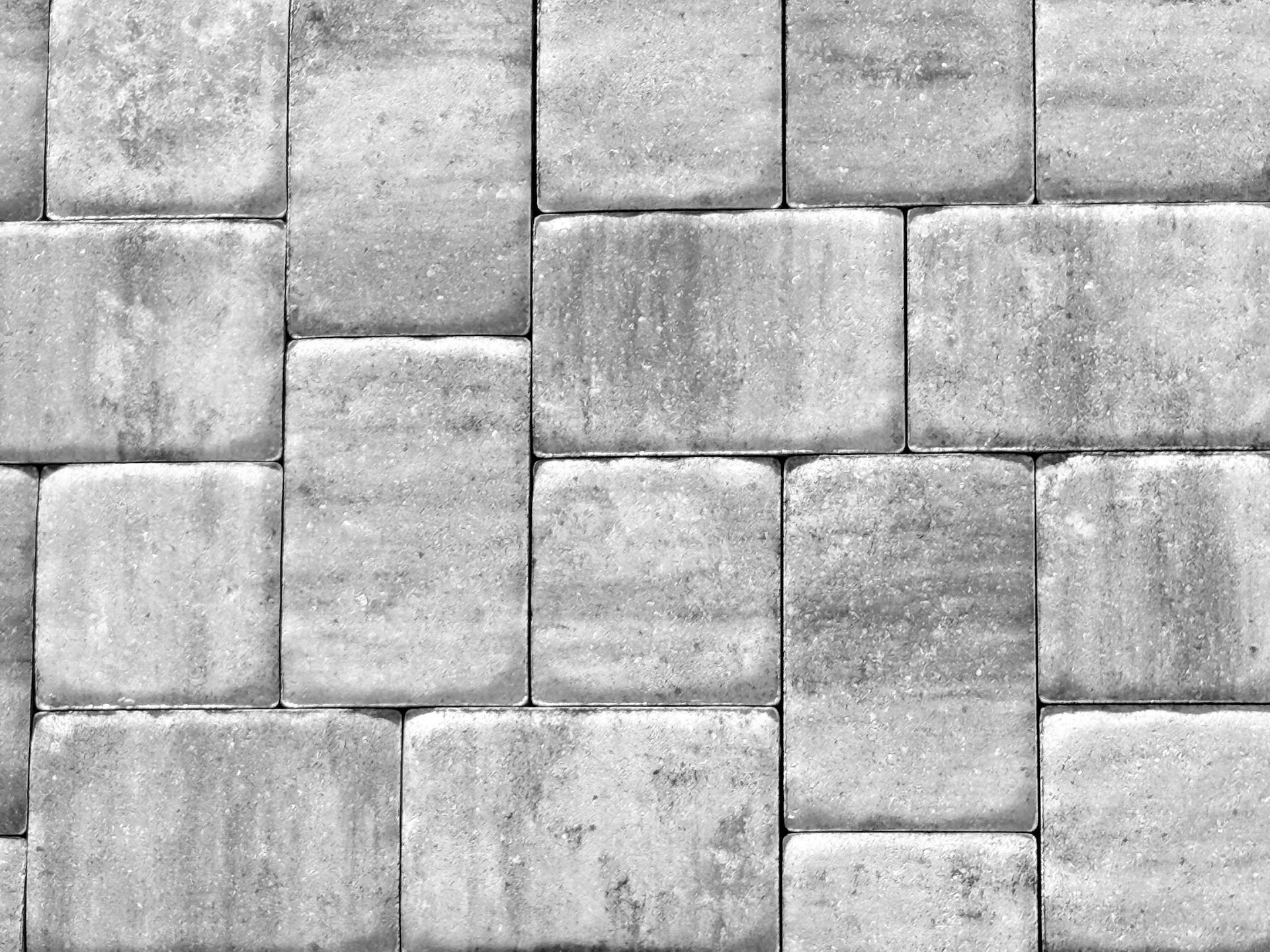 A close-up of a gray brick wall.