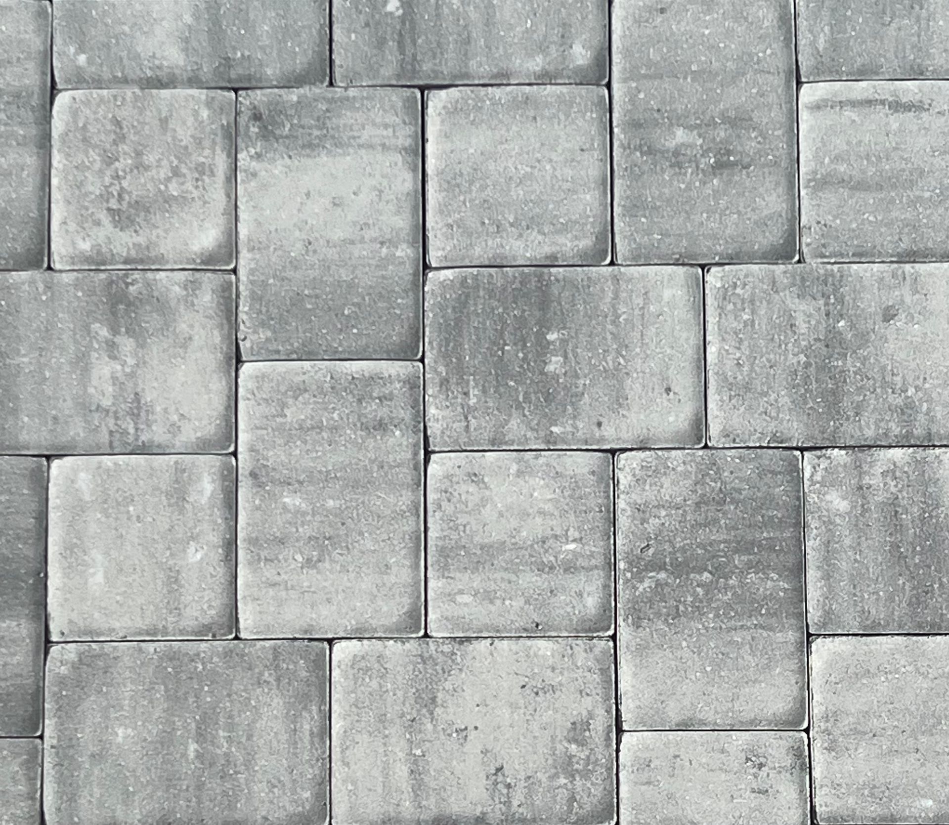 A close-up of a gray brick wall.