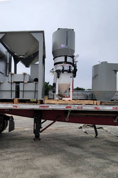 A trailer with a large machine on top of it