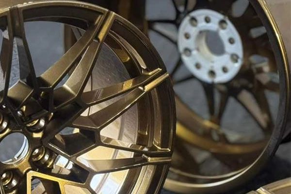 A close up of a pair of gold mags.