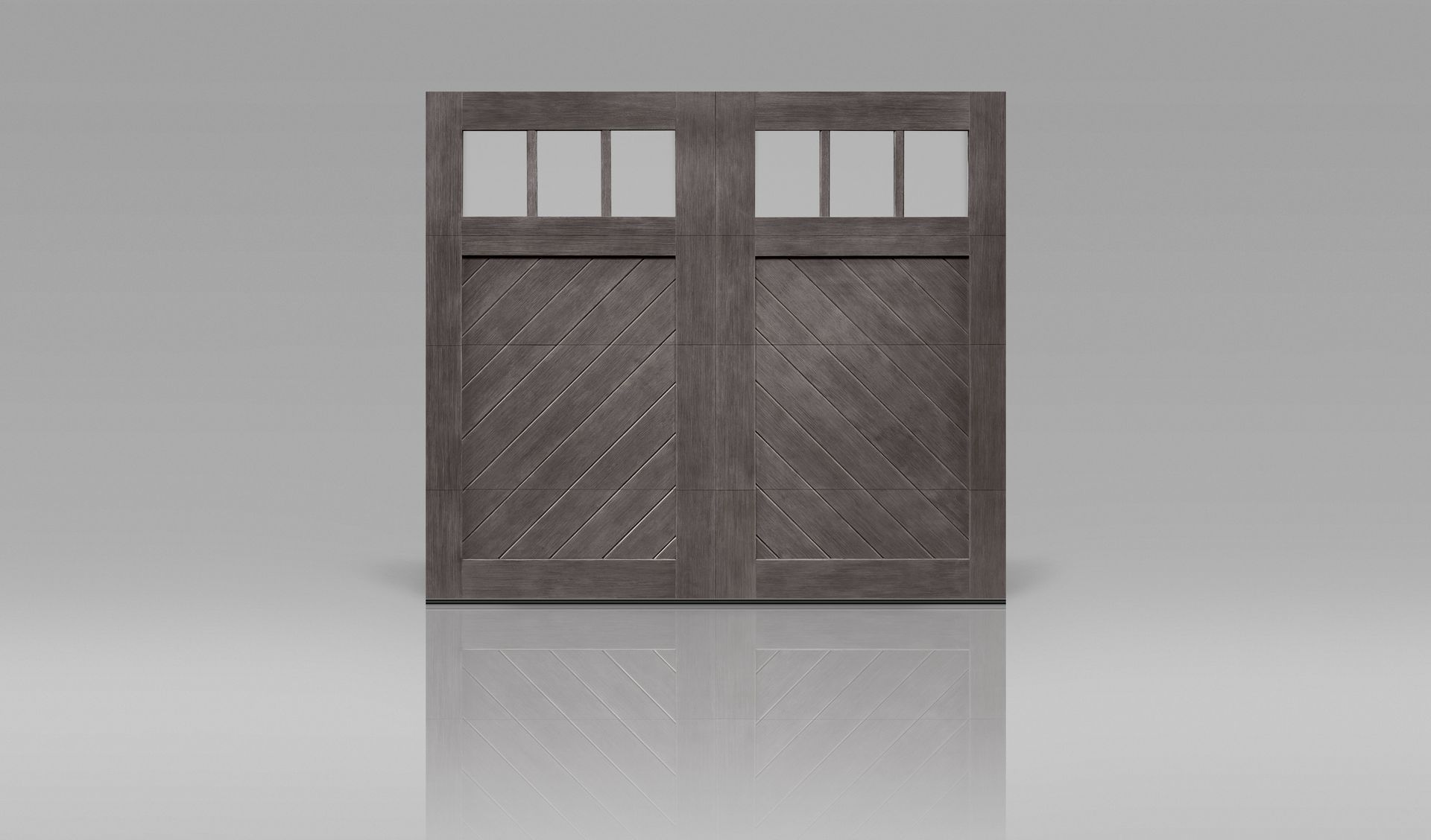 Weathered gray wooden double garage door with small windows at the top