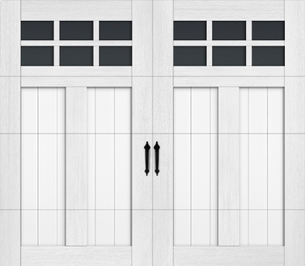 White double garage door with dark windows and decorative hardware.