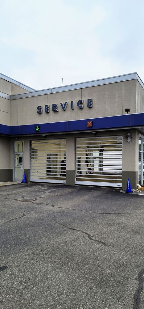 Exterior of a car service center with the word 