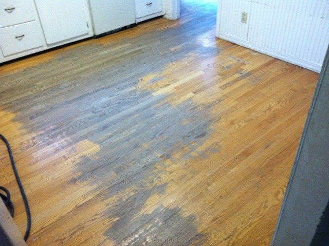Wood Kitchen Floor Before by Justin Heider Flooring