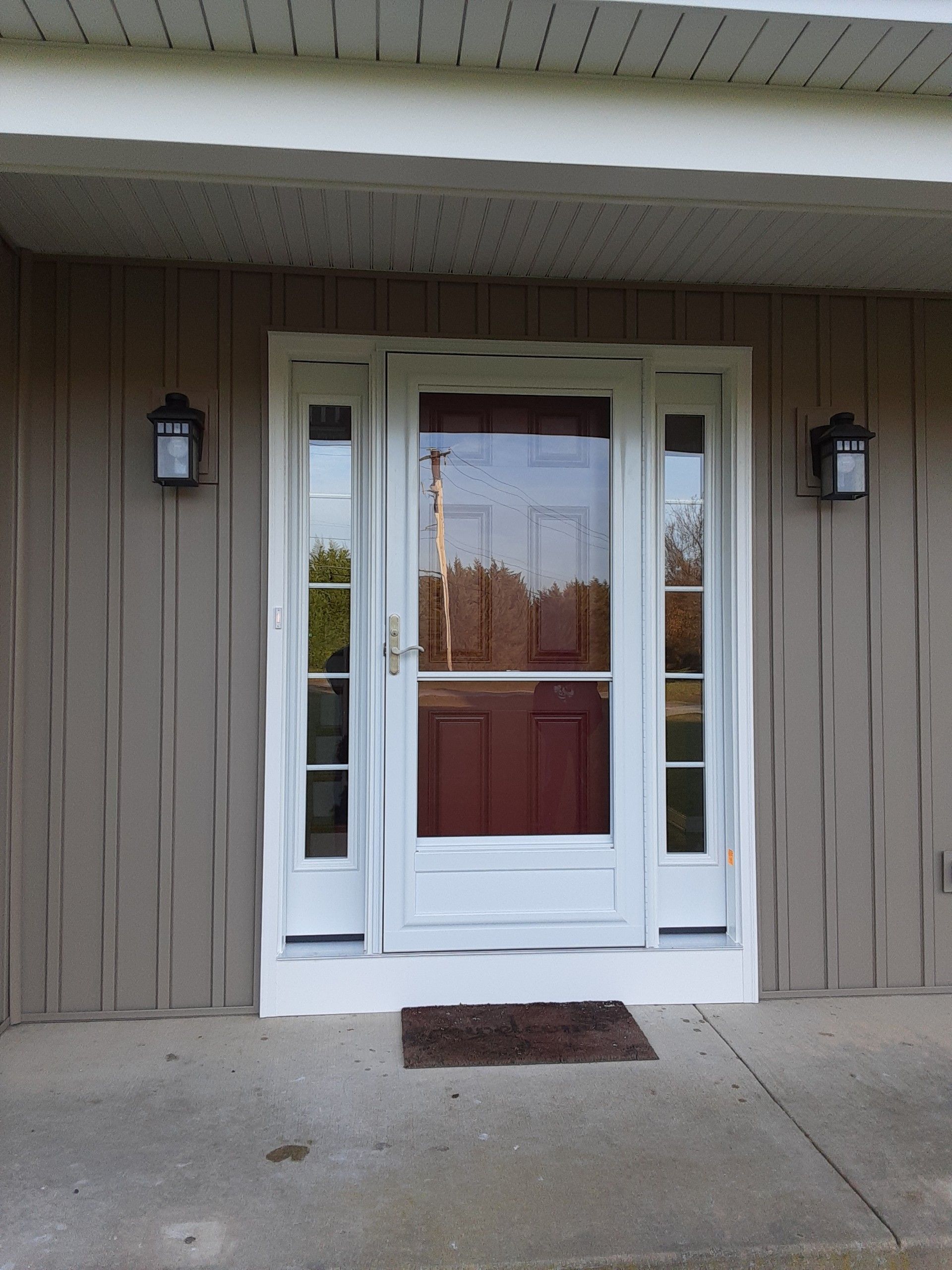 Front entrance with white double doors