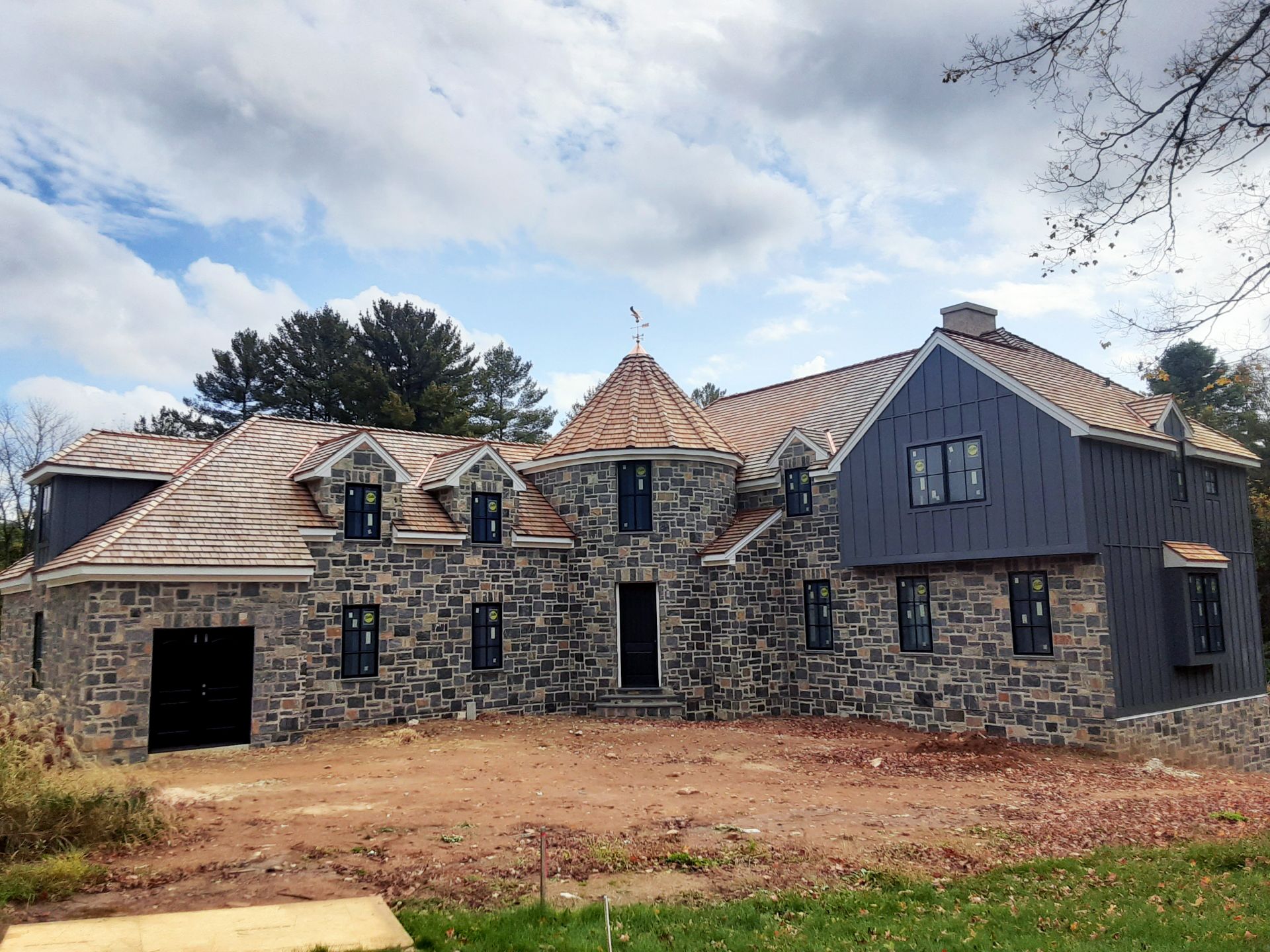 Stone house with unfinished yard