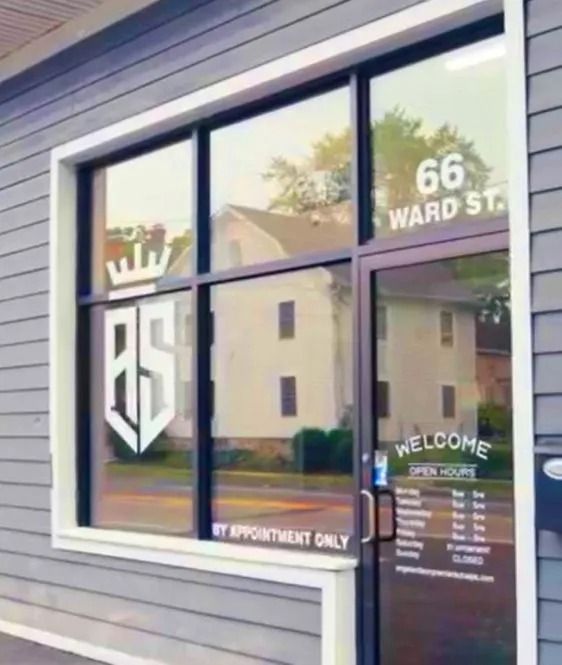 Exterior of business with logo "BS" and address "66 WARD ST." on the window. "BY APPOINTMENT ONLY" is also visible.