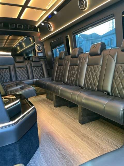 the inside of a van with lots of leather seat