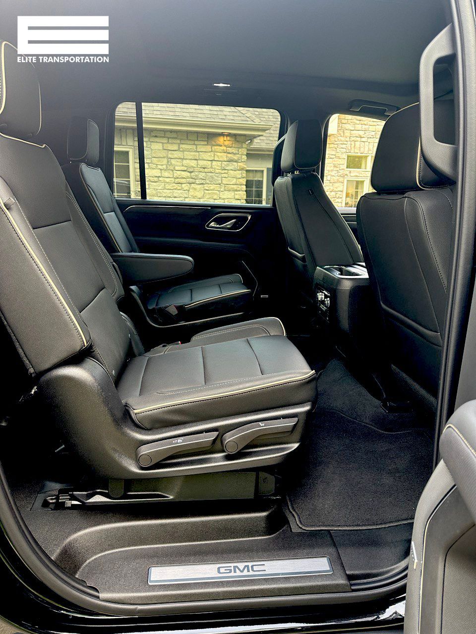 the back seat of a gmc suburban is shown with the door open