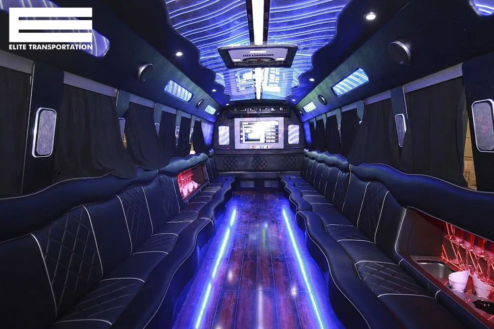 the inside of a limousine with blue lights on the floor