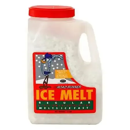 Container of Road Runner ice melt, red lid, white granules, red and green label featuring the cartoon character.