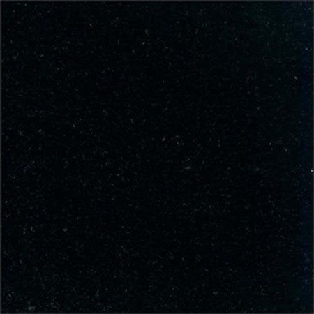 Black, glossy surface with subtle flecks.