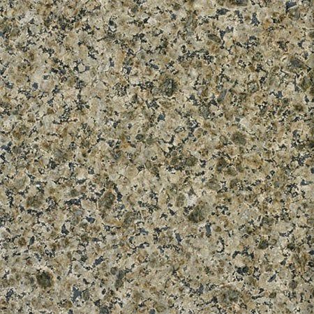 Close-up view of a tan and dark-speckled granite surface.