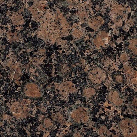Brown and black speckled granite stone surface.
