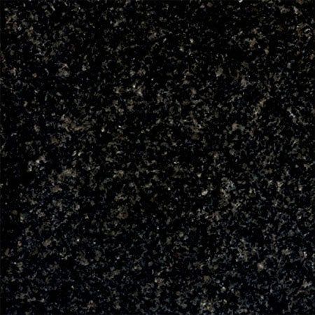 Black granite surface with small, speckled light-colored mineral grains.
