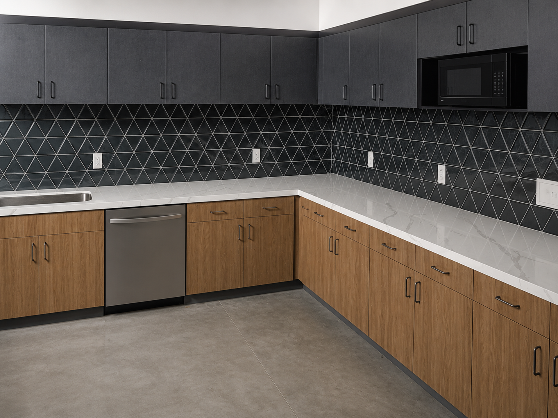 Modern kitchen with dark cabinets, wood lower cabinets, white counters, and black tiled backsplash