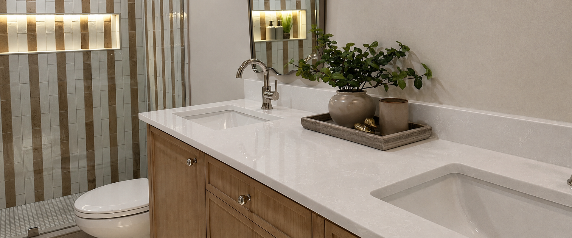 Modern bathroom vanity with white countertop, wood cabinets, sink, mirror, and striped shower curtain