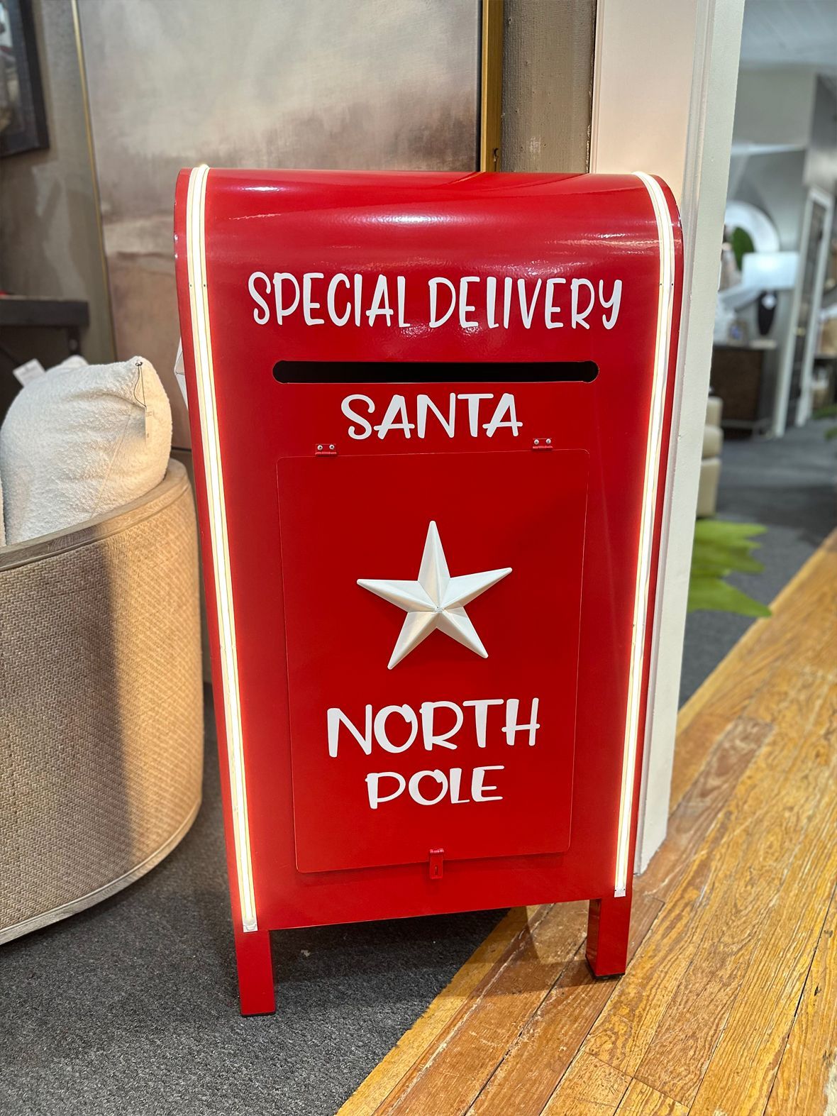 Red mailbox-style decoration labeled “Special Delivery Santa North Pole” with a white star.
