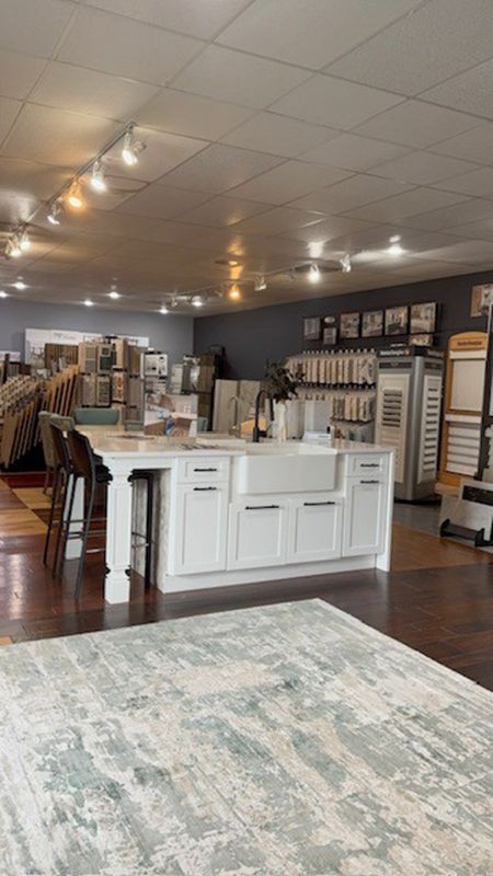 Modern furniture showroom with white kitchen island displays