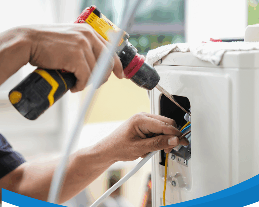 A technician uses a power drill to install or repair the wiring of an air conditioning unit.