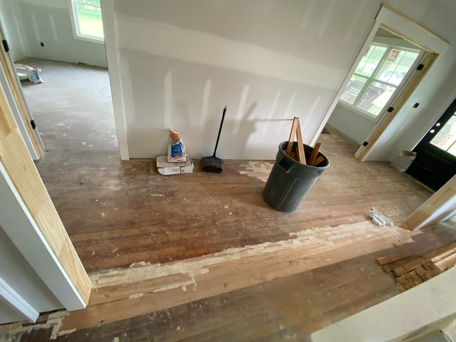 A room with an unfinished floor