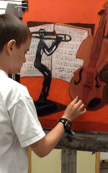 Boy painting Violin