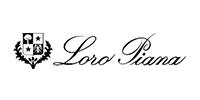 The Loro Piana logo featuring a black and white crest with symbols, leaves, and elegant cursive script.