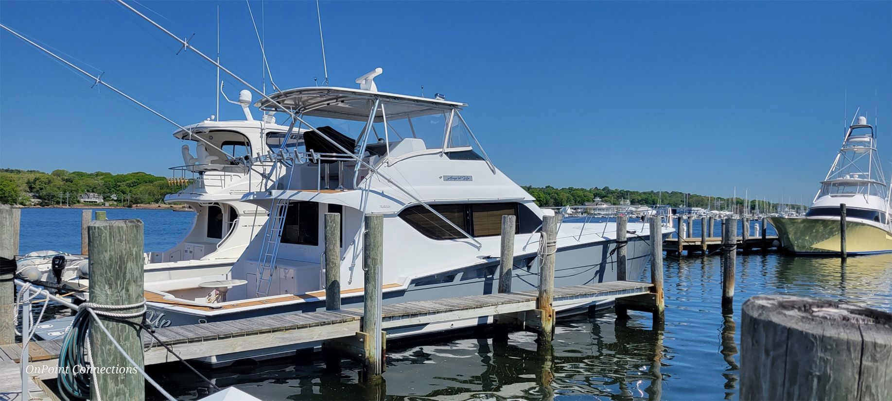 A boat is docked at a dock in the water.