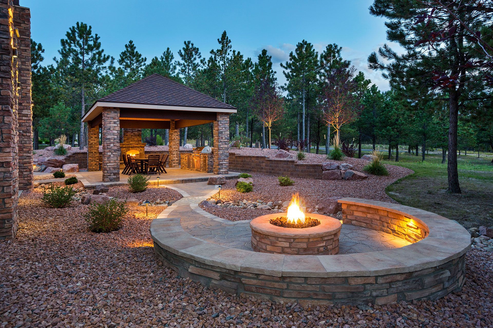 Outdoor fireplace on patio and walkway