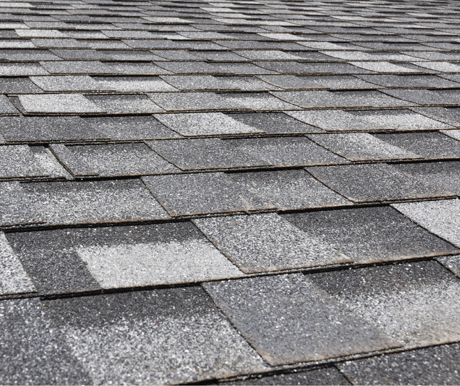 Close-up of a gray asphalt shingle roof.