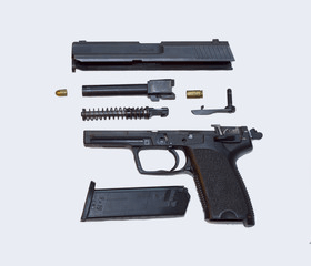 A disassembled gun
