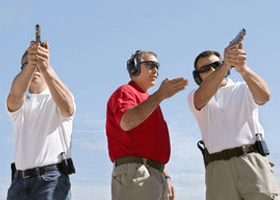 Three men on the gun range