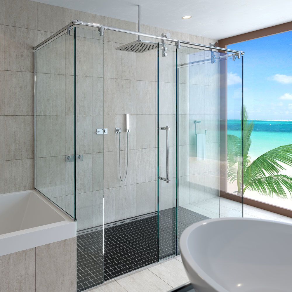Modern glass-walled bathroom with ocean view, tiled shower, bathtub, and freestanding tub.