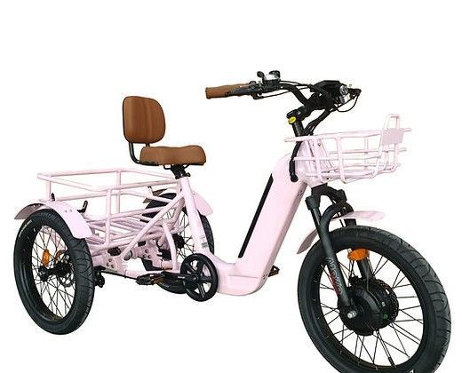 A pink tricycle with a basket and a brown seat