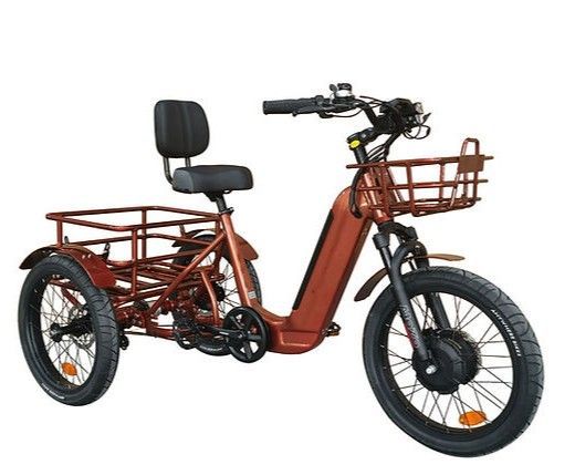 A red tricycle with a basket on the front