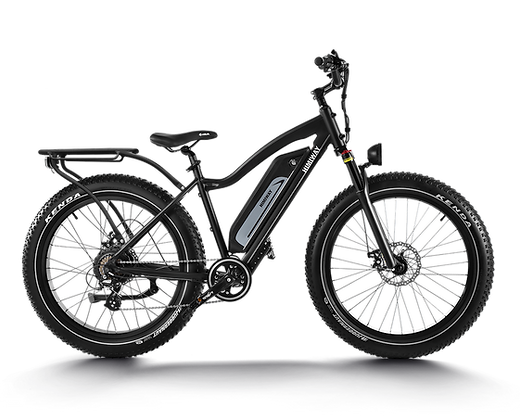 A black electric bike is sitting on a white surface.