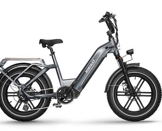 A gray electric bike with a large tire on a white background.