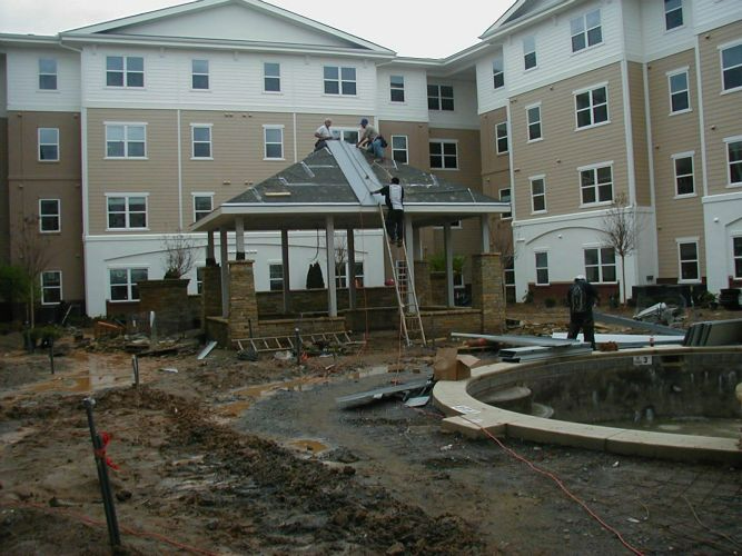 a large building with a gazebo in front of it