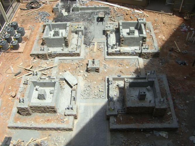 a construction site with a lot of concrete blocks