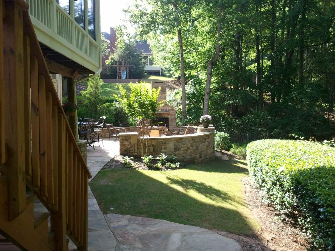 a wooden deck with stairs leading up to it