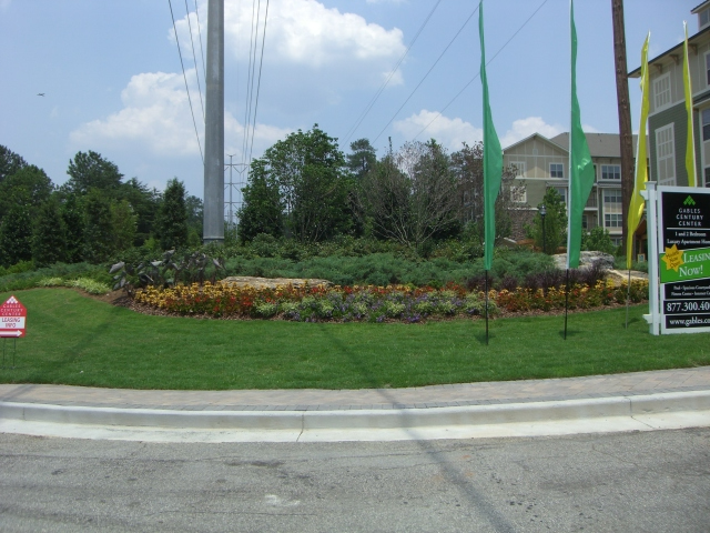 a roundabout with a sign that says ' a ' on it