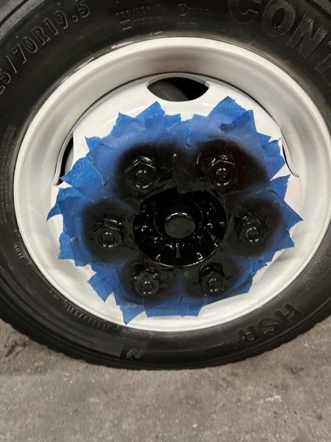 A close up of a truck tire