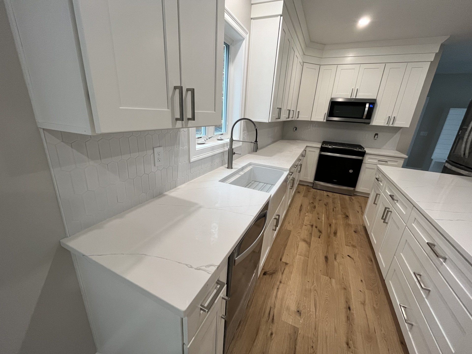 New decorated white large kitchen