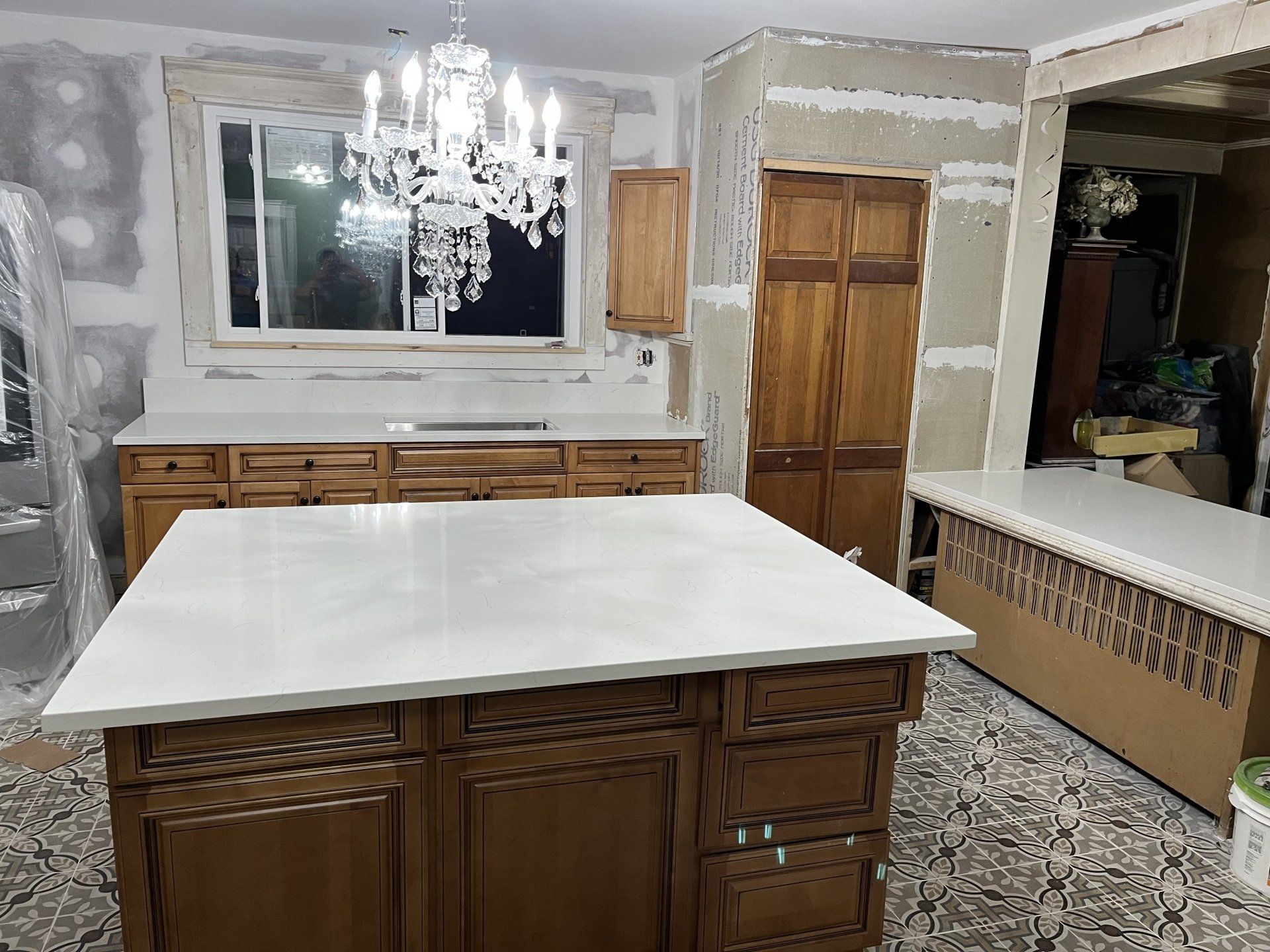 Kitchen remodel with chandelier