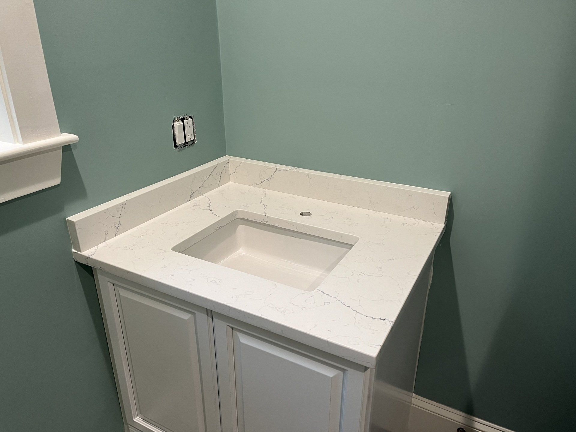 Bathroom sink with cabinet
