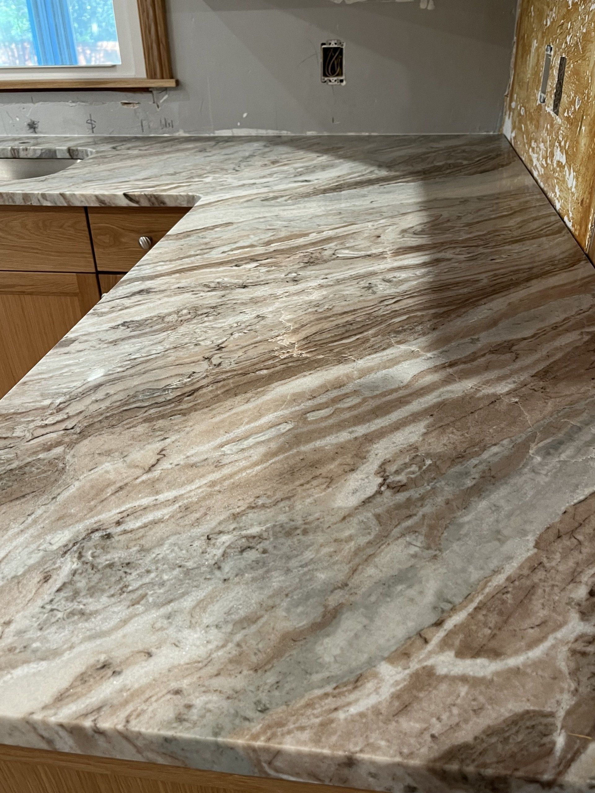 Brown, white, and gray colored  marble countertop
