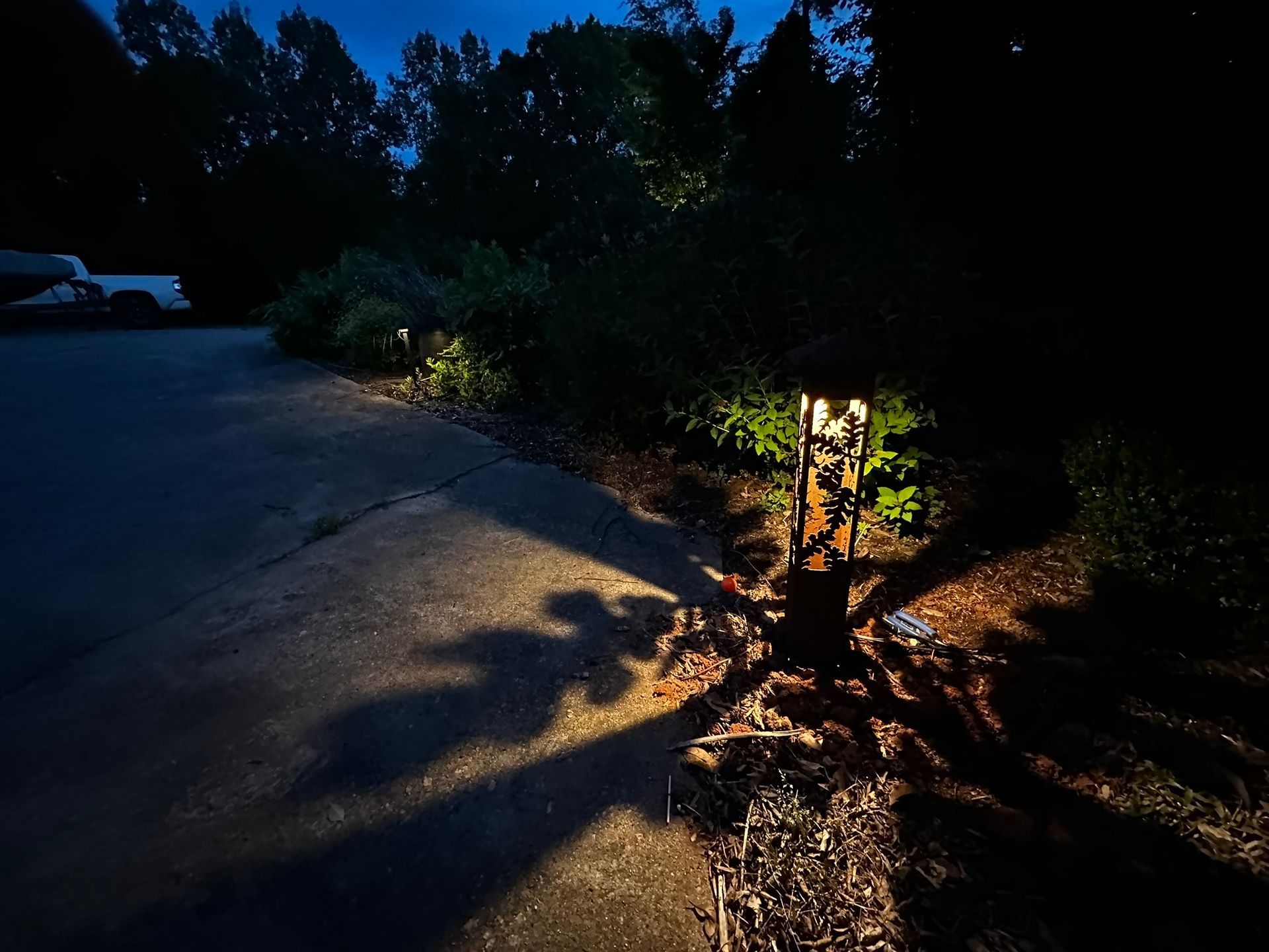 Corten Steel accent light with oak features. 