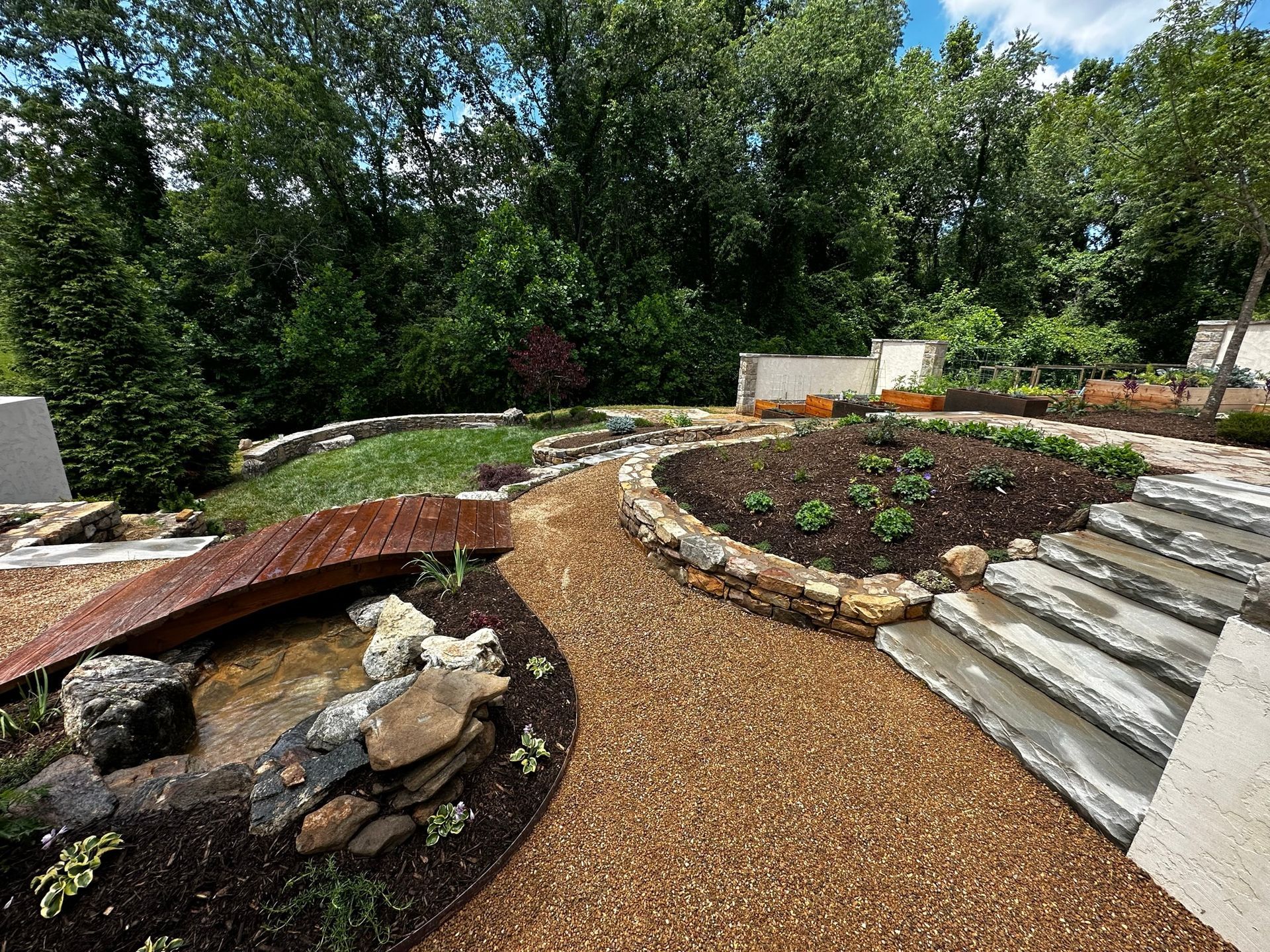 There is a bridge in the middle of the garden.